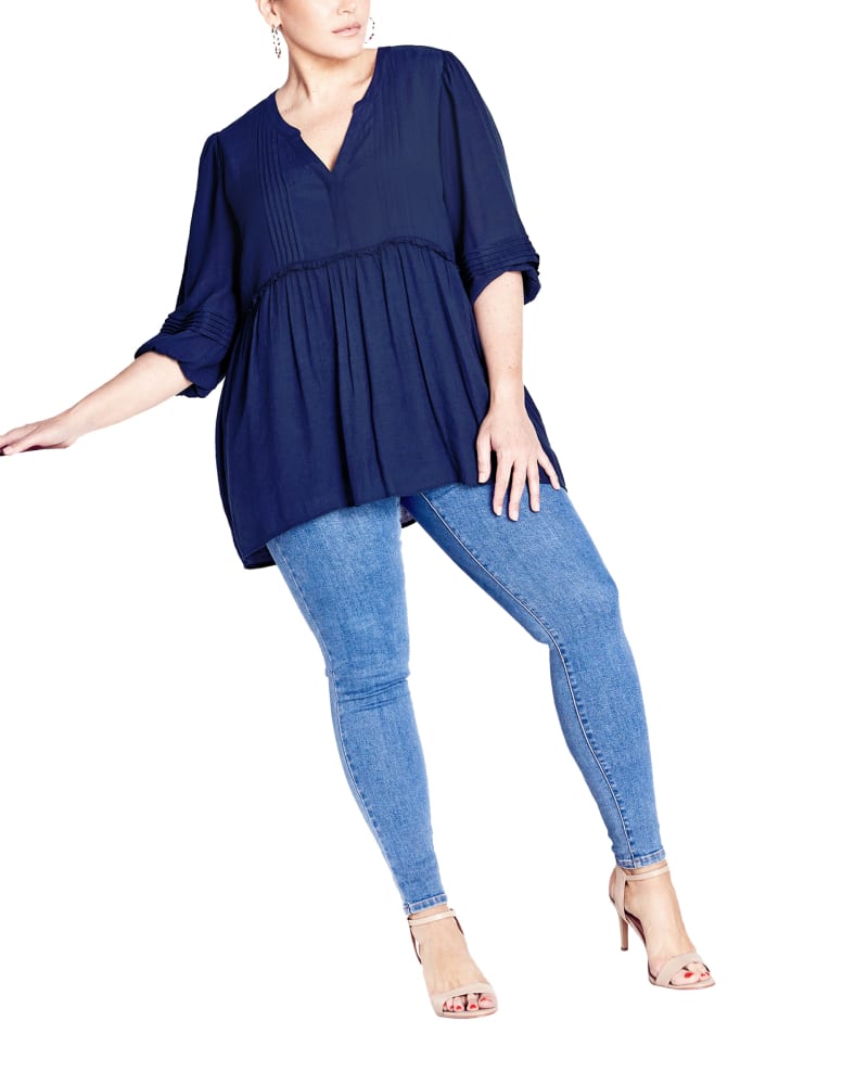 Front of a model wearing a size 16 Ashley Pintuck Top in Navy by avenue. | dia_product_style_image_id:288525